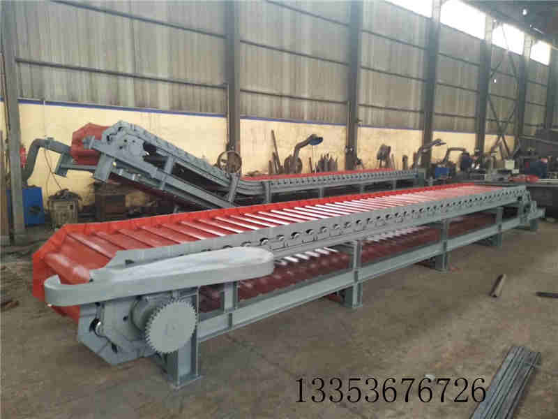 破碎后的矿石块料链板式喂料机